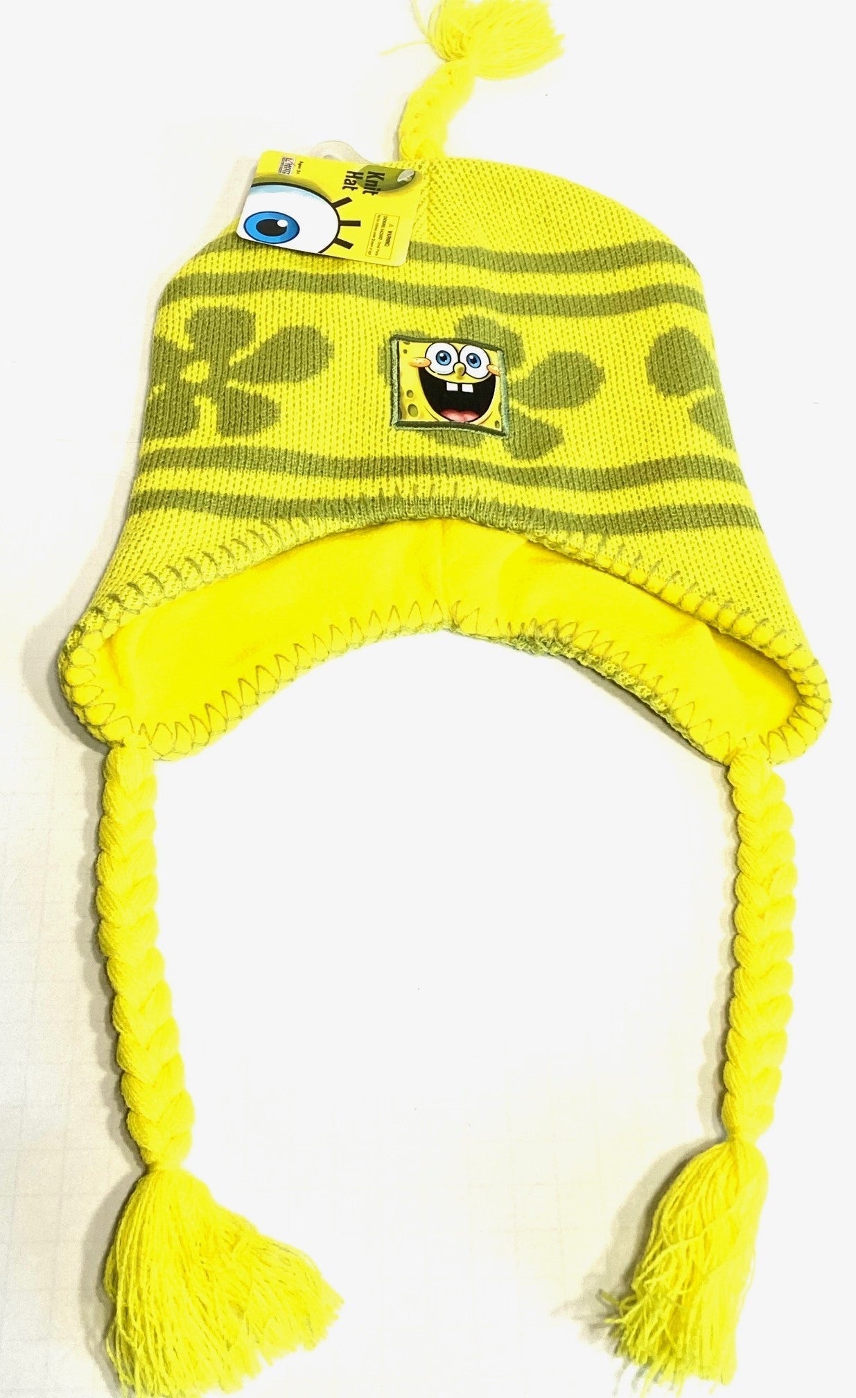 A yellow knit hat with a SpongeBob SquarePants character design on the front.